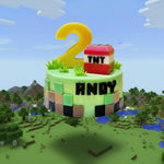 Children's birthday cake with number and 'TNT' block on a yellow background